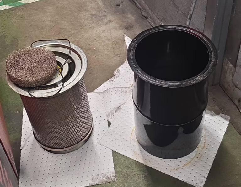 Removed oil separator element from 75 kW variable speed air compressor during servicing